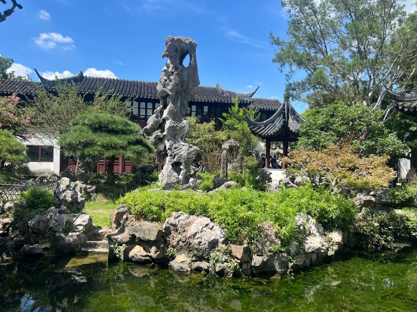 The Lingering Garden, arranged around the Cloud-Crowned Peak. Book the four-day when the gardens are the point.